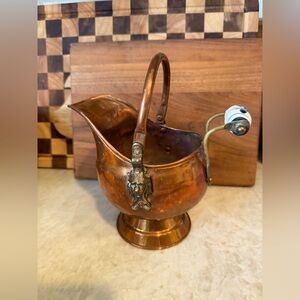 Antique copper fireplace scuttle decor